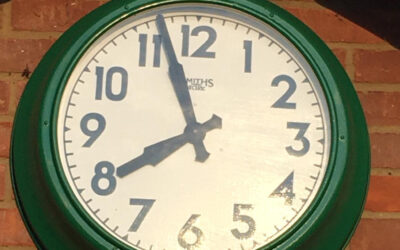 Club legend fixes the clock!